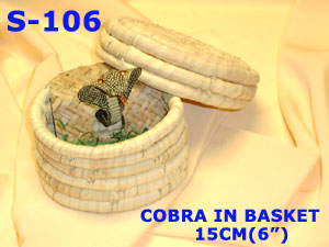 S 106  COBRA IN BASKET         