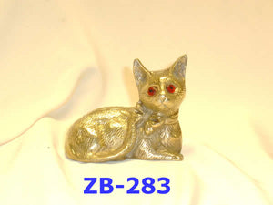 B 283 BRASS CAT SITTING  WITH BOW AND TIE         